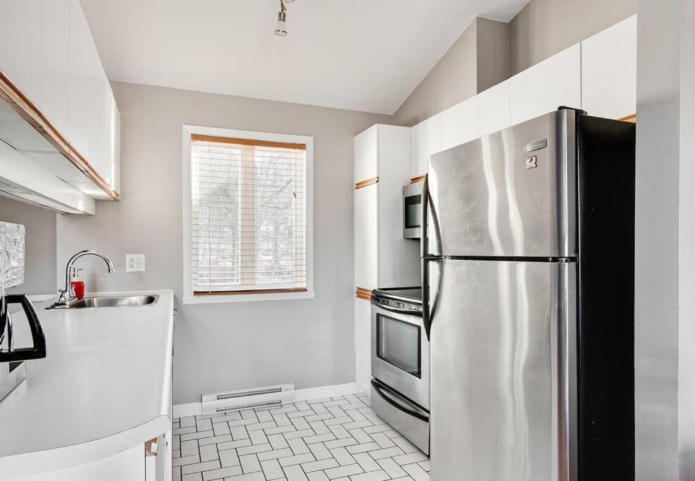Le Cozy-Condo A Louer A Stoneham Esterno foto